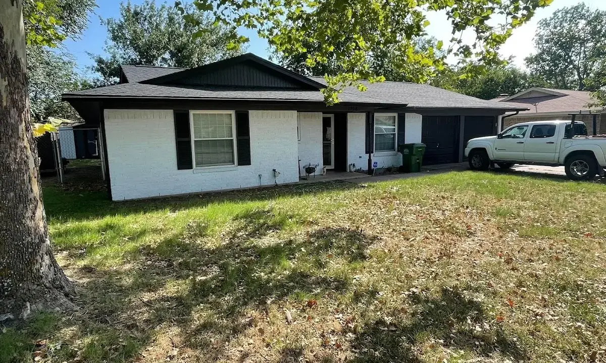 Professional roofing crew working on a residential roof in Reedsburg